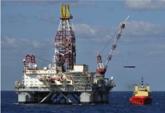 Lifting hooks are in use on offshore rigs Oil Rig Offshore North Sea